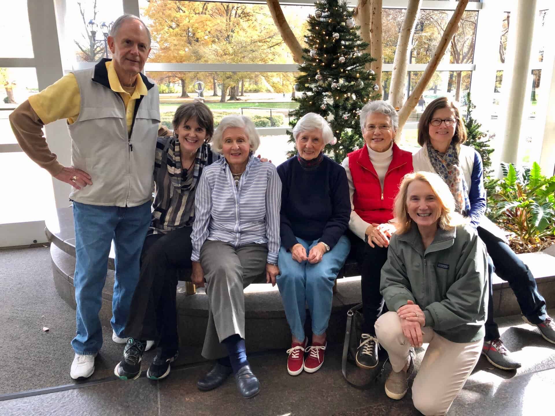 Christmas decorations at Mint Museum Randolph Road with garden club members.